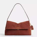 Coach Mira Shoulder Bag in cognac suede leather with gold Coach tag charm