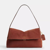 Coach Mira Shoulder Bag in cognac suede leather with gold Coach tag charm