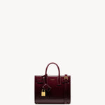 Saint Laurent Sac de Jour Baby Bag in burgundy glazed leather with gold hardware